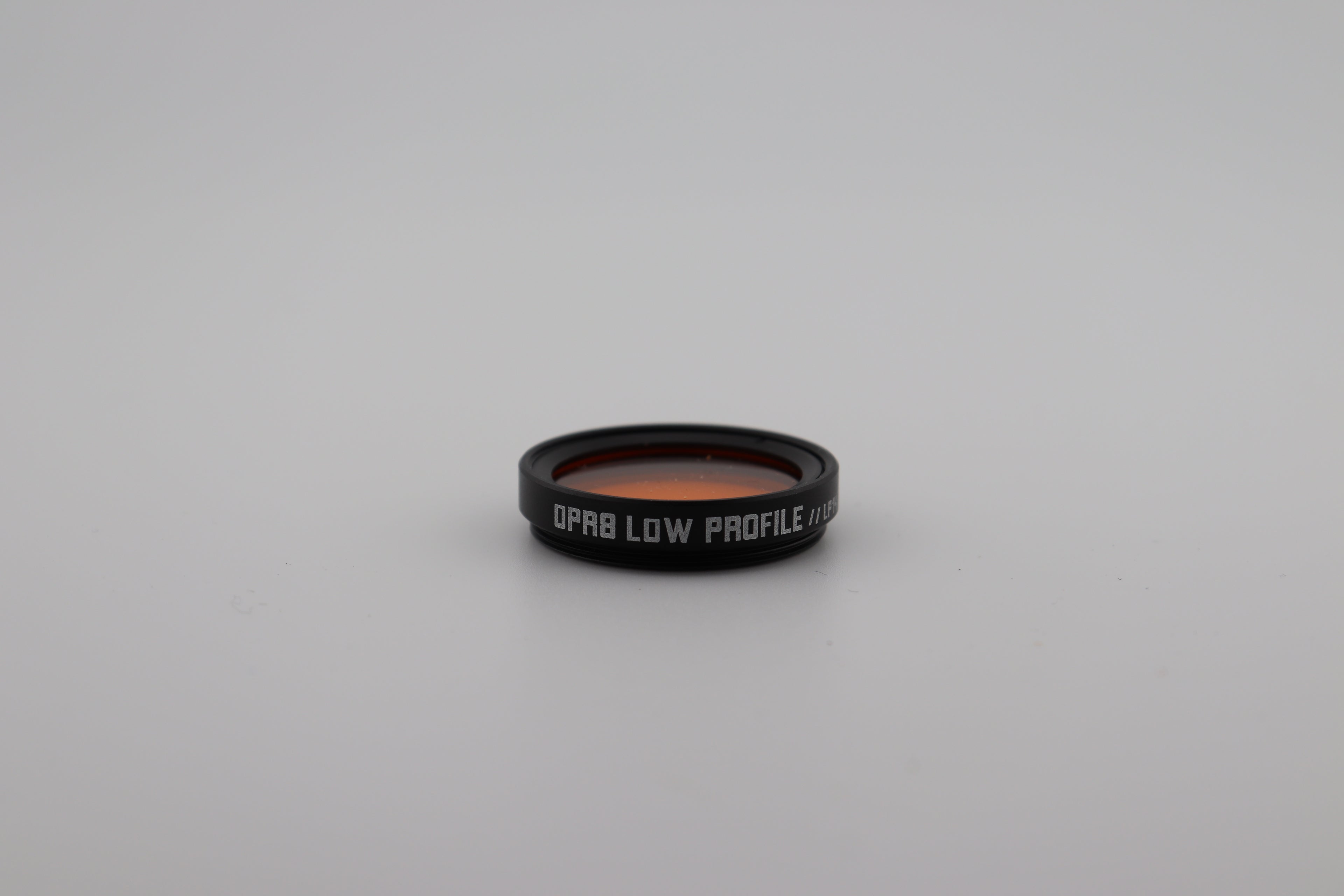The OPR8 Low Profile Half-Amber Filter
